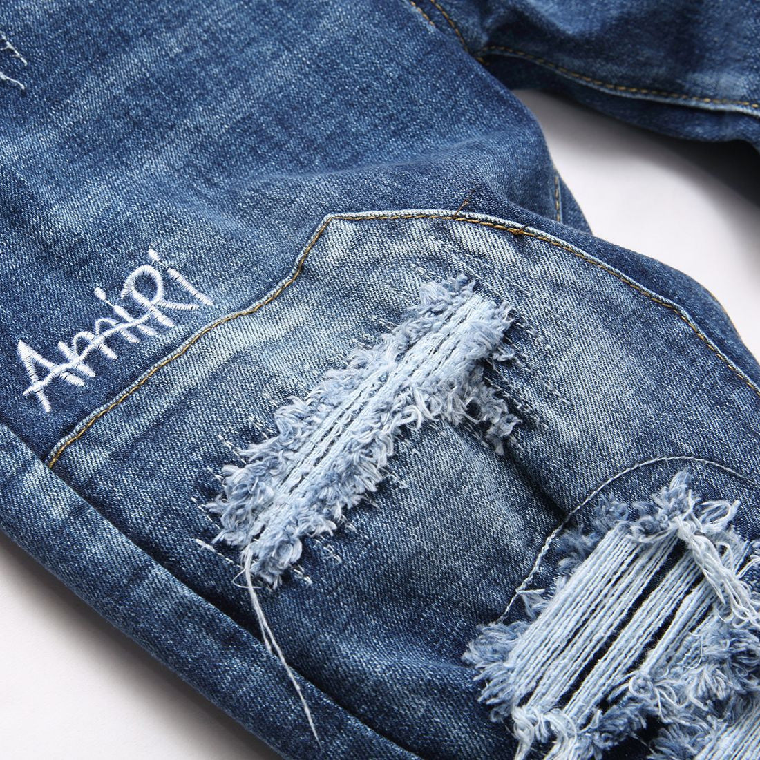 Amiri Jeans Ripped Stretch Jeans